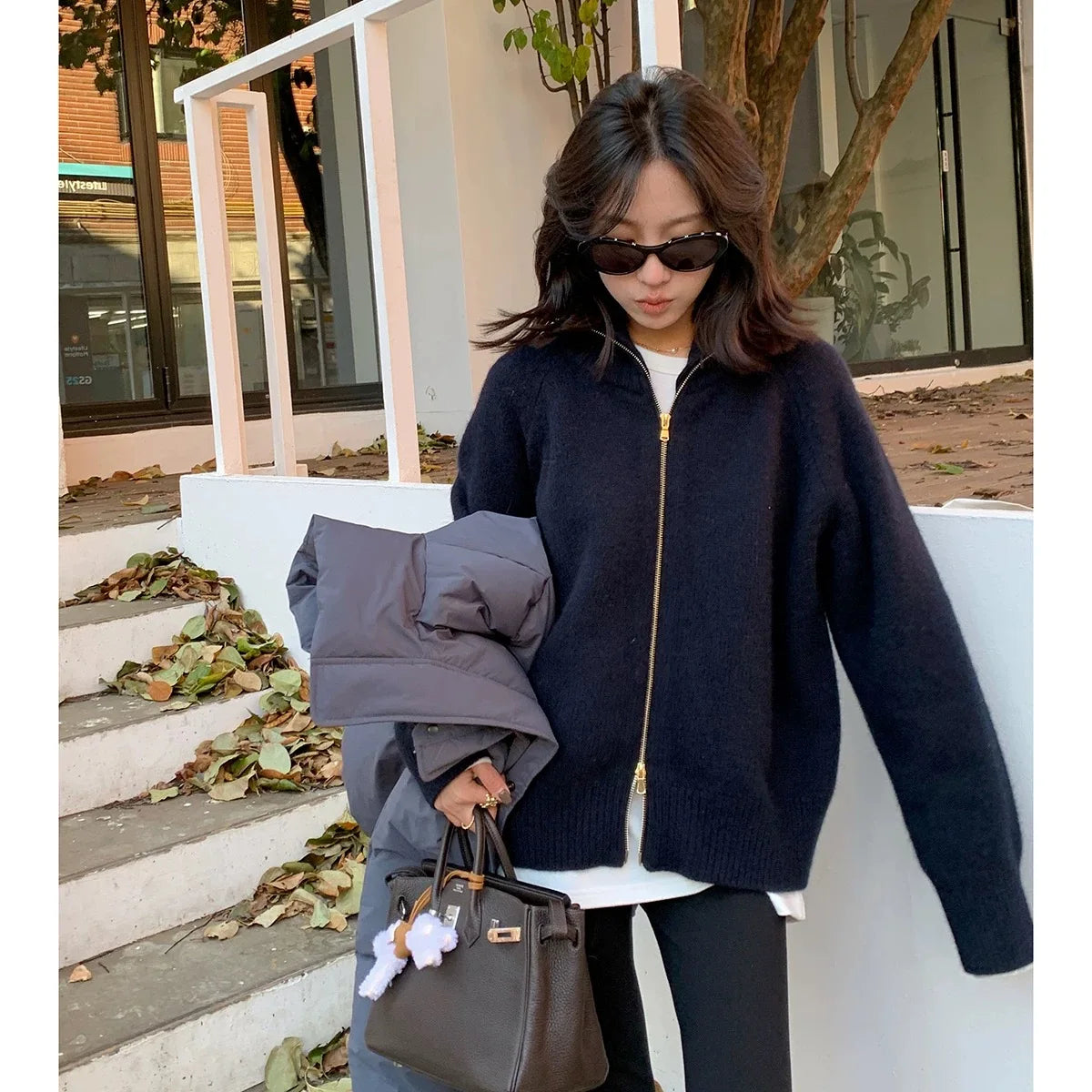 Autumn and winter new zipper cashmere sweater women cardigan lapel sweater coat lazy wind loose.