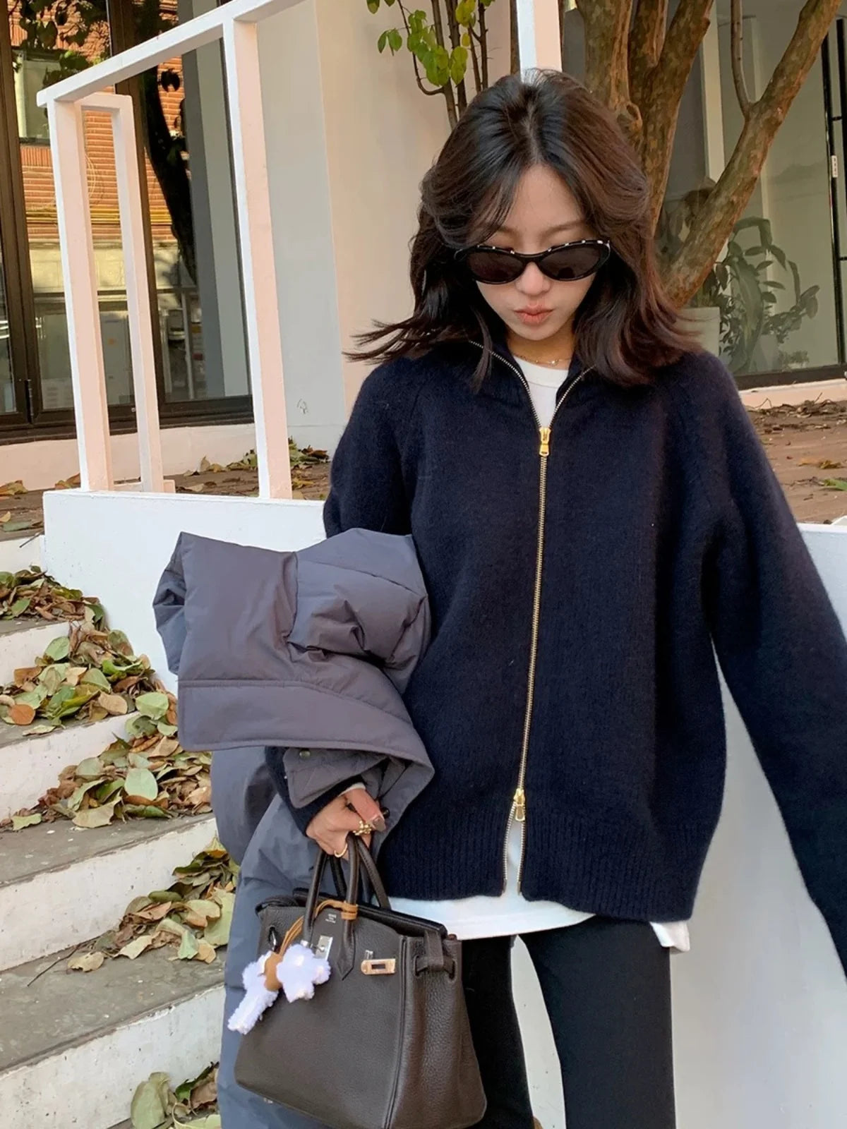 Autumn and winter new zipper cashmere sweater women cardigan lapel sweater coat lazy wind loose.